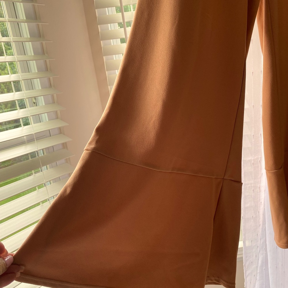 By Eric. Polyester and spandex. Wide leg palazzos. Extra Large. Dressy or casual